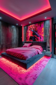 a large bed sitting under a pink light in a bedroom