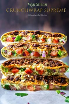 vegetarian crunchwrap supreme stacked on top of each other