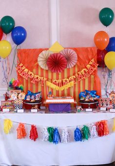 a circus themed birthday party with balloons and decorations