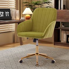 a green office chair sitting on top of a rug