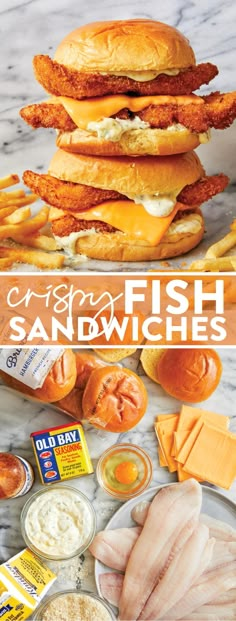 an image of fish sandwiches with cheese and sauces on the side, along with other ingredients