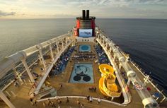 the top deck of a cruise ship with water slides