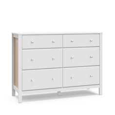 a white dresser with six drawers and two doors