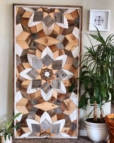 a wall hanging made out of wood pieces