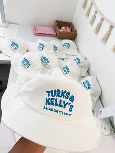 - DETAILSEvery order is printed (with so much love!) in South Florida US 🇺🇸 , Where we Print and Ship your order with the best Quality materialsOur bucket hats feature a satin string on the inside that can be used to tighten the fit of the hat as neededInner circumference area measures approximately 22.5”All Prints printed with ink, not embroidered.- Feel free to send us your special request if you would like to design your own shirt/sweatshirt etc (we love custom orders!)- HOW TO CUSTOMIZECho Bucket Hat Bachelorette, Bachelorette Bucket Hats, Cool Merch Ideas, Merch Ideas Products, Wedding Merch, Birthday Merch, Disposable Camera Wedding, Wedding Hats For Guests