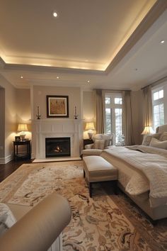 a large bed sitting in the middle of a living room next to a fire place