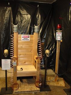 a chair made out of wood and metal pipes