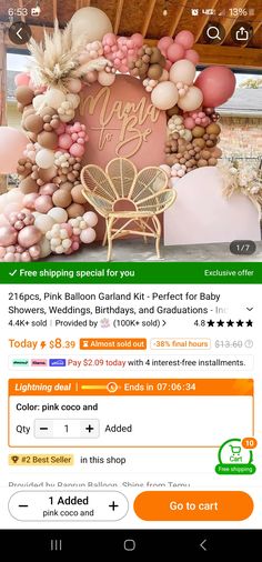 a pink balloon garland for a baby shower is on the app store's website