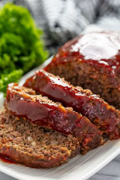 meatloaf with ketchup on a cutting board