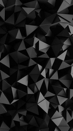 an abstract black and white background consisting of many triangular shapes that appear to have been folded together