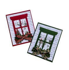 two christmas window cards with bows on them