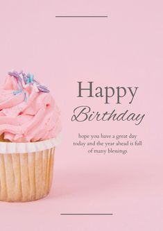 a cupcake with pink frosting and sprinkles is on a pink background