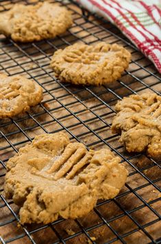 peanut butter cookies cooling on a rack in the oven, ready to go into the oven