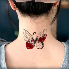 a woman's neck with a butterfly tattoo on the back of her neck and red flowers