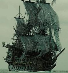 an old pirate ship sailing in the ocean