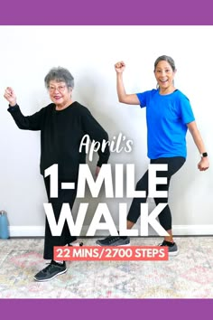 two women are dancing in front of a wall with the words, 1 - mile walk