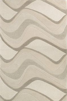 a beige rug with wavy lines on the top and bottom, in shades of grey