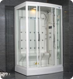 a bathroom with a walk in shower next to a fireplace