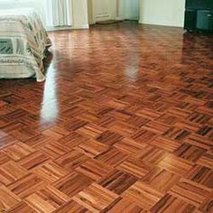 an empty room with hard wood flooring in it