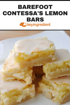 a white plate topped with lemon bars on top of a wooden table and text overlay that reads, barefoot contessa's lemon bars