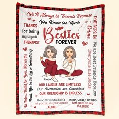 a red and black blanket with two women on it