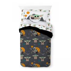 an image of a bed set with baby yoda and star wars characters on it