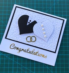 congratulations card with two wedding rings on it