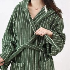 The bathrobe measures 112 x 124 cm for adults 155-180 cm tall. The cloak, sized 70 x 70 cm when folded, is suitable for children aged 5-12 with a recommended height of 90-140 cm. Winter Sleep Robe In Cotton, Winter Cotton Sleep Robe, Winter Sleep Cotton Robe, Long Sleeve Robe With Pockets For Home, Green Sleep Robe, Cotton Robe With Long Sleeves For Sleepover, Cotton Long Sleeve Robe For Sleepover, Cotton Long Sleeve Robe For Winter, Oversized Long Sleeve Robe For Sleep