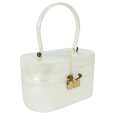 a white plastic box with a lock on the top and handle to hold something in it