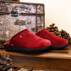 This classic slipper silhouette is updated for today's at-home lifestyle with a detailed plush upper and footbed that incorporates a built-in arch for enhanced support. Easily slip-on these full coverage slippers for warmth and a secure fit for all-day comfort. Featured in a plush Fuzzy Wuzzy Wine colorway. These slippers are so comfy that you'll forget to take them off! Wine And Slippers, Fun Slippers, Brown Slippers, Grey Slippers, Fuzzy Wuzzy, Classic Slippers, Black Slippers, Warm Slippers, Last Call