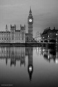 the big ben clock tower towering over the city of london