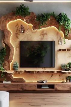 a living room with a large tv and plants on the wall