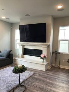 the living room is clean and ready to be used as a den or family room