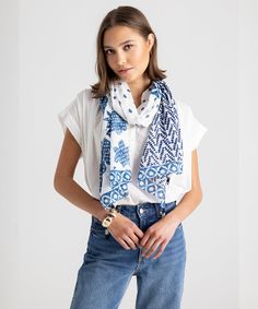 With a patchwork-inspired print featuring indigo patterns from across our spring collection, this cotton wrap scarf adds easy interest to casual, everyday outfits. Dimensions: 27 in. x 72 in.Materials: 100% Cotton Luxury Traditional Batik Print Dupatta, Blue Cotton Summer Scarves, Blue Casual Cotton Scarf, Casual Blue Cotton Scarves, Casual Blue Cotton Scarf, Patterned Cotton Bohemian Scarves, Bohemian Cotton Scarf With Pattern, Indigo Pattern, Batik Scarf