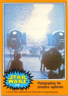 a star wars card with an image of two men in the background and fireworks coming out of them