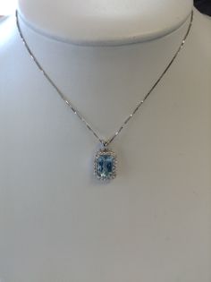 Custom 3.8 carat emerald cut aquamarine pendant with diamond halo. Aquamarine Necklace Pendant, Fancy Jewelry Necklace, Pretty Jewelry Necklaces, Aquamarine Pendant, Aquamarine Necklace