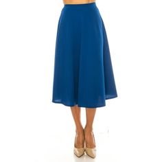 Product Description: Elevate your wardrobe with our Women's Flared Lightweight Elastic Midi A-Line Skirt. Designed for both comfort and style, this versatile skirt features a flattering A-line silhouette and a flowy, flared design. The lightweight fabric ensures breathability and ease of movement, making it perfect for any season. The elastic waistband provides a secure and comfortable fit, allowing you to wear it all day with ease. Whether you're dressing up for a special occasion or keeping it Moa Collection, Golf Skirts, Long Maxi Skirts, Floral Print Skirt, Work Wear Women, Gray Skirt, Printed Skirts, A Line Skirt, Lightweight Fabric