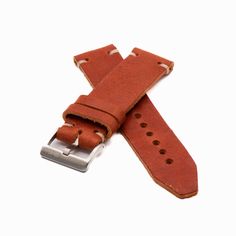 This handcrafted leather watch strap is the epitome of rugged luxury. Made by expert leather-crafters in the southeastern U.S., it is the perfect complement to any watch, forging the ideal union of form and function. As with any quality full grain leather product, your unique use of the strap will change its shape, color, and texture over time. You are not only buying a watch strap – you are embarking on a journey to create something unique and personal over the coming months and years.   The full grain bovine leather comes from the renowned Horween Leather Company in Chicago. Honing their craft since 1905, Horween uses old world techniques coupled with proprietary processes and their own formula of natural oils and greases to create a work of unmatched durability and natural beauty.    Tw Horween Leather, Leather Product, Leather Company, Leather Watch Strap, Handcrafted Leather, Natural Oils, Watch Strap, Full Grain Leather, Old World