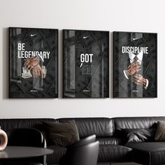 three black and white posters on the wall above a couch in a modern living room