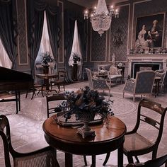 an old fashioned dining room with chandelier and chairs in the center, piano on the far wall