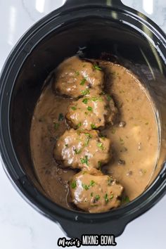 meatballs and gravy in a slow cooker