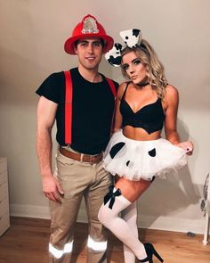 a man and woman dressed up in costumes