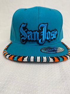 the san jose snapback hat is blue and orange