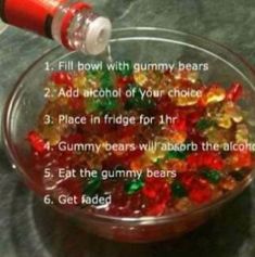 a glass bowl filled with gummy bears