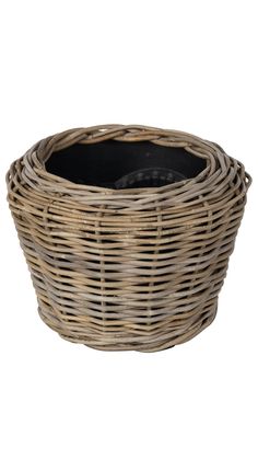 a wicker basket with a black bowl inside