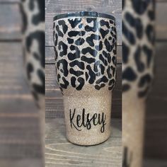 a leopard print coffee cup with the word kelsey on it