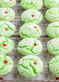 green and red cookies cooling on a wire rack