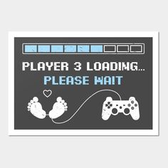 a sign that says, player 3 loading please hat with two video game controllers on it