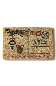 a door mat with a christmas ornament on it