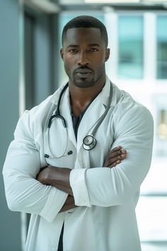 a male doctor in a white coat and stethoscope standing with his arms crossed